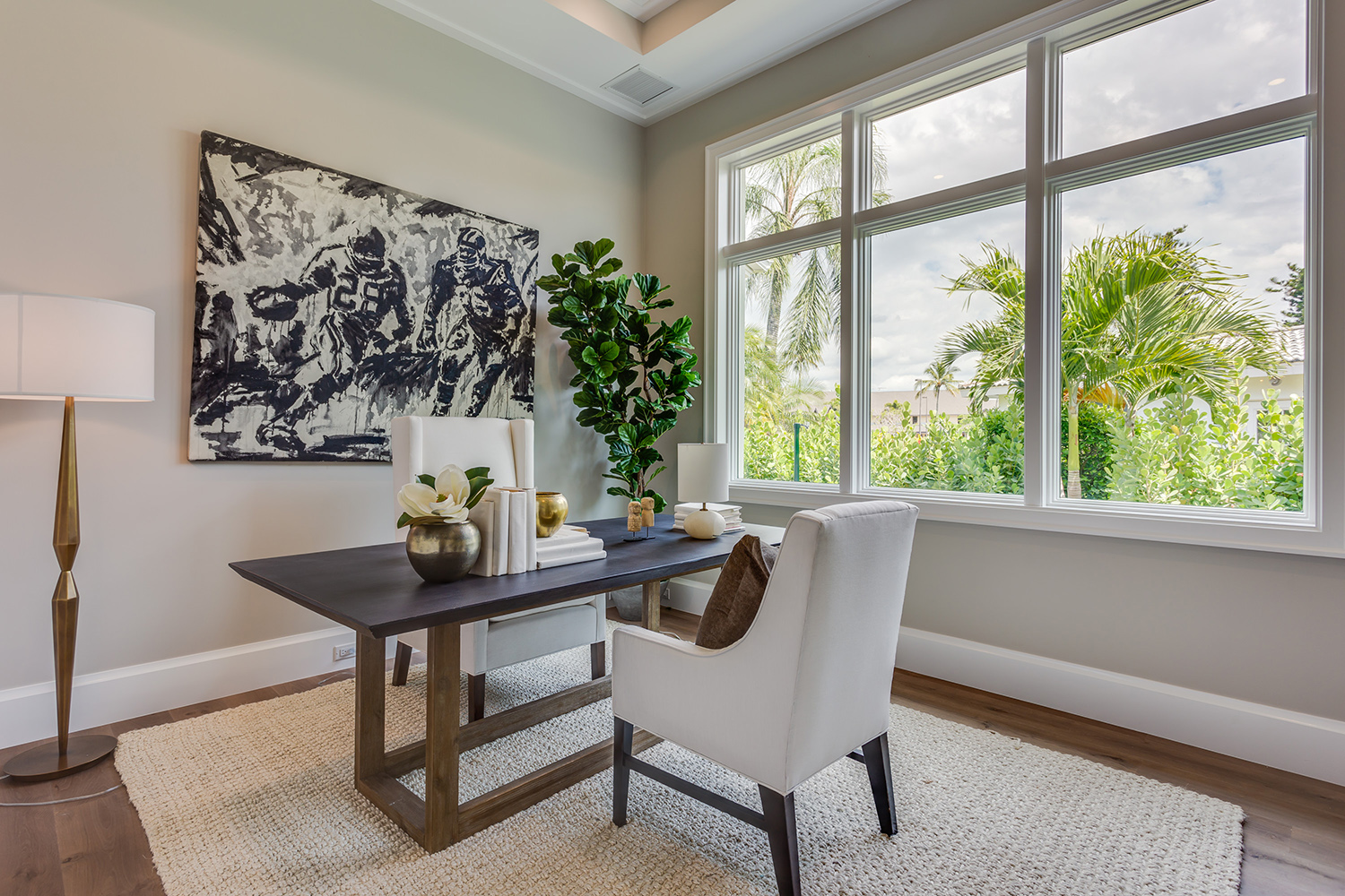 south-florida-design-study-with-wood-desk-and-2-white-chairs-located-in-the-2-story-coastal