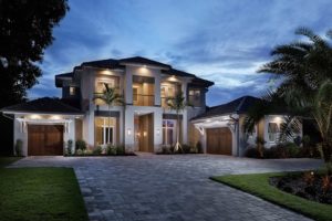 2-Story Coastal Contemporary house plan features 4,738 square feet, great room, double island kitchen, 2 laundry rooms and an outdoor living space with summer kitchen designed by South Florida Design located in Naples, Florida