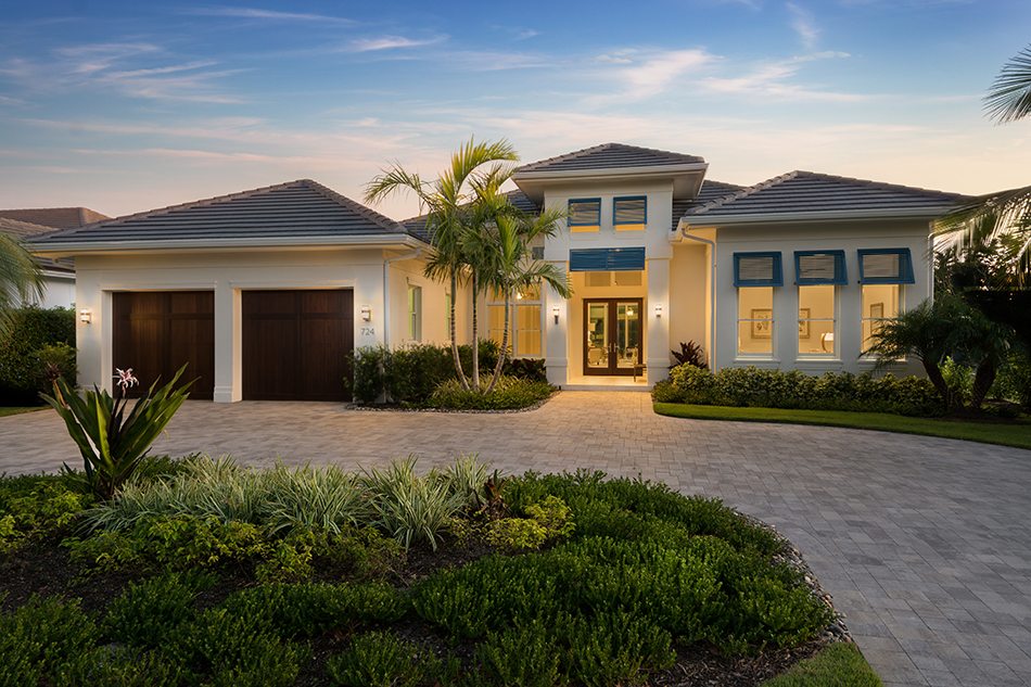 4 bedroom waterfront house plan features open floor plan, great room, island kitchen with pantry, study and covered lanai with outdoor kitchen designed by South Florida Design located in Naples, Florida