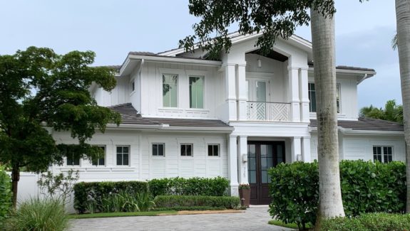 View of the front elevation of a 2-story coastal contemporary house